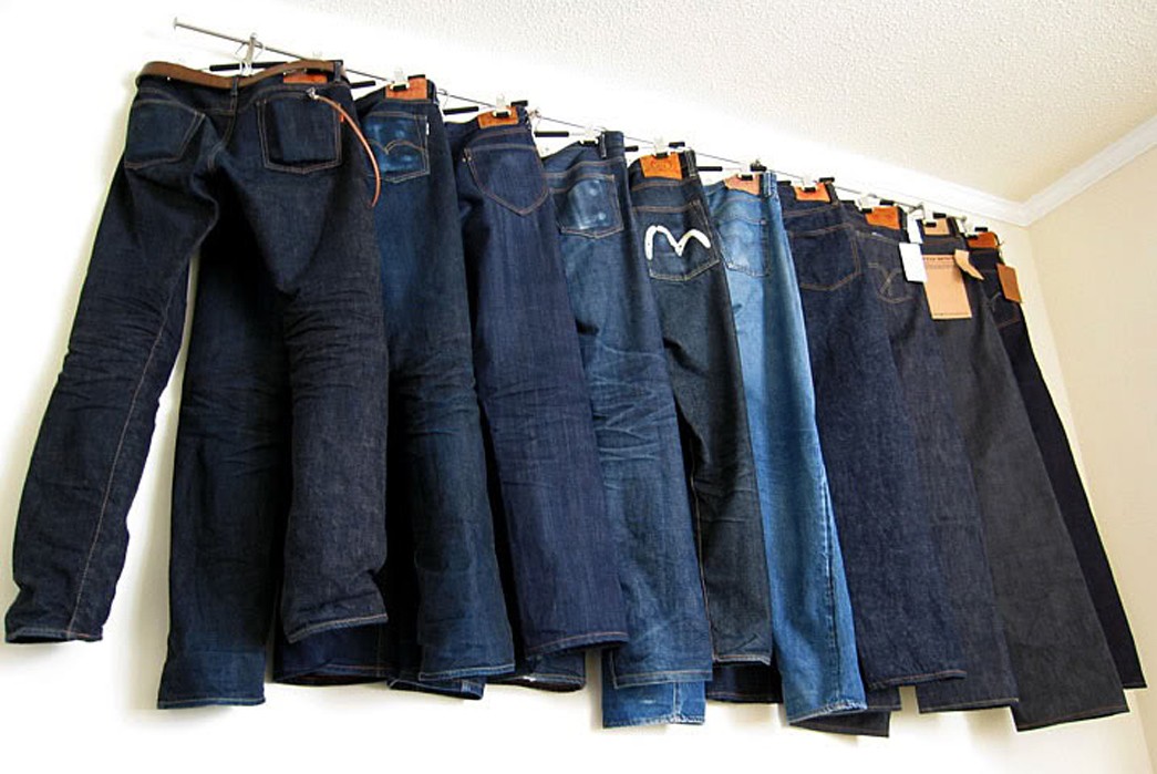 how-to-store-your-raw-denim-properly-and-easily-on-hangers-white-wall