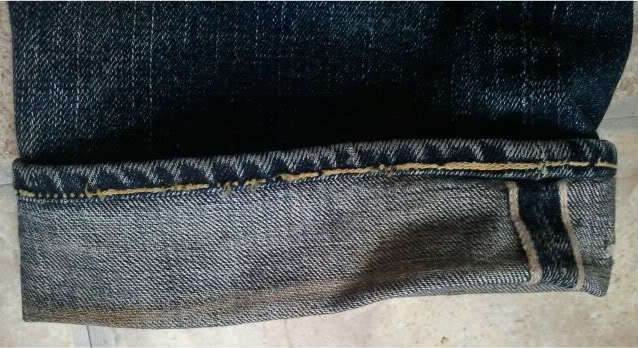Roping effect on the World Tour jeans, hemmed by Blue In Green's Union Special