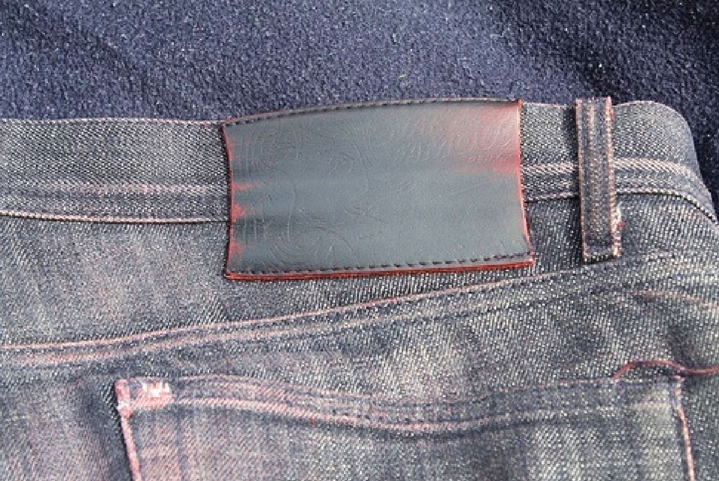 fade-friday-nf-red-core-selvedge-various-stages-of-wear-back-top-label