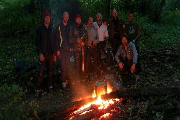 The crew enjoying from the self started fire