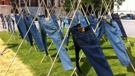 stand up jeans hung in field