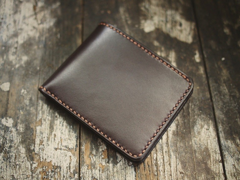 A Hollows Leather bifold wallet, made from Chromexcel leather.