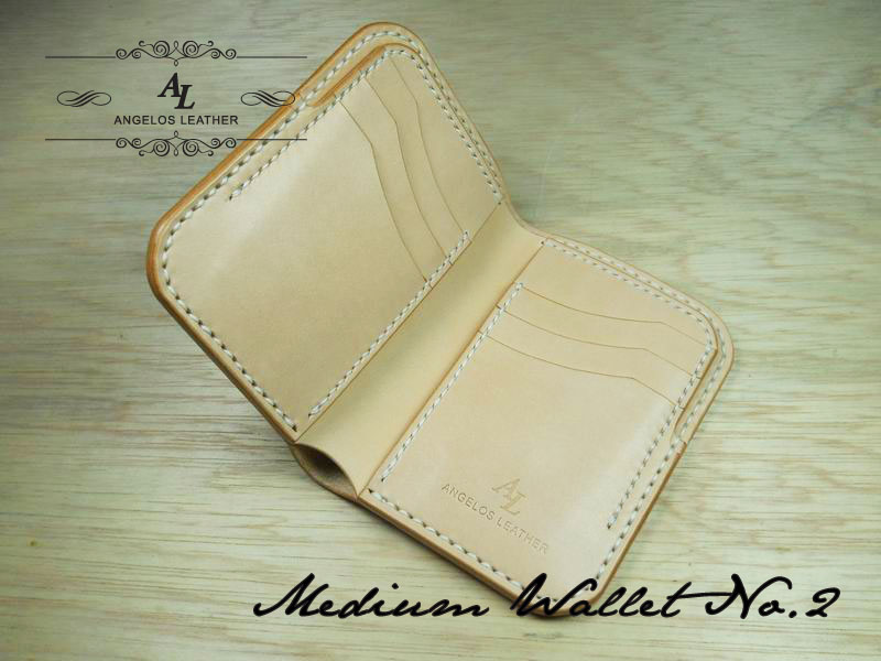 An Angelos Mid Wallet, made from natural veg tan cowhide.