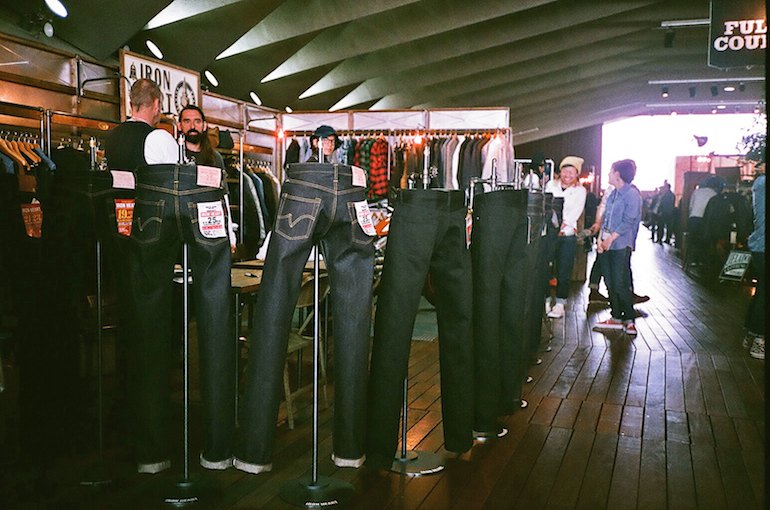 Jeans wall at Iron Heart booth at Clutch Collection