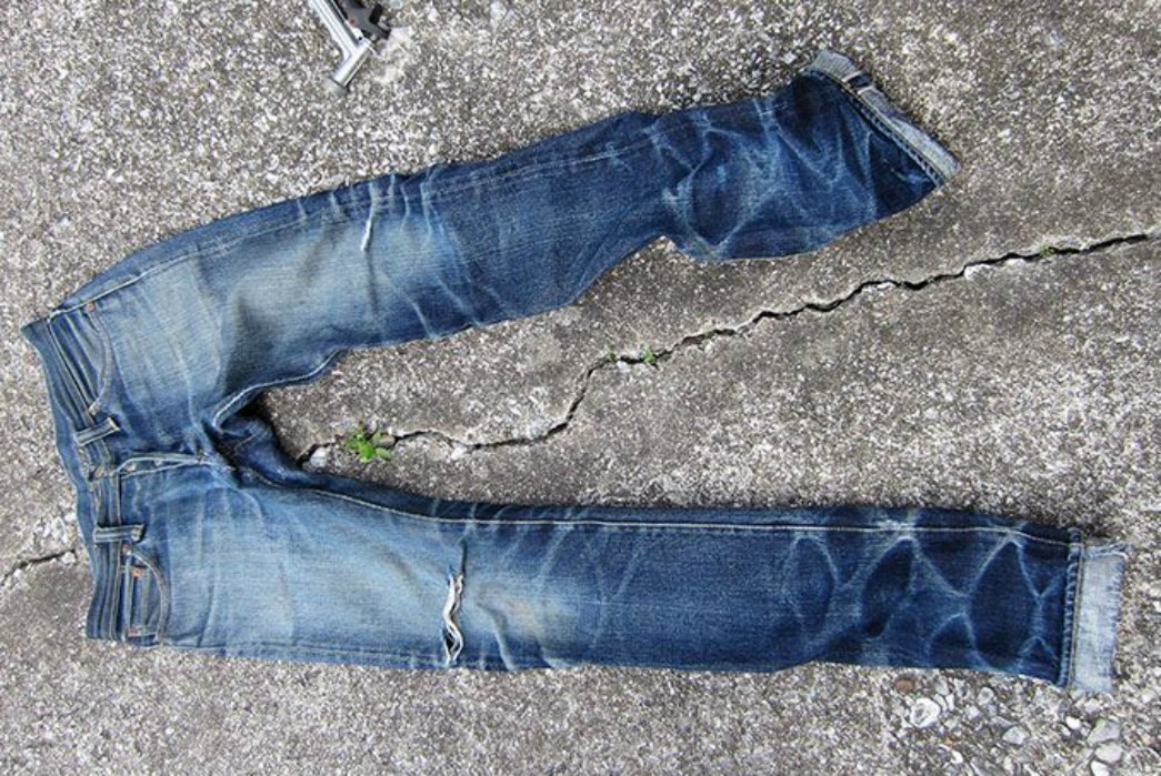 A pair of well faded jeans.