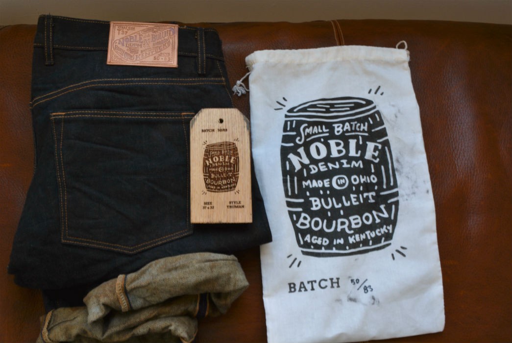 Noble x Bulleit denim with provide sack and piece of oak barrel