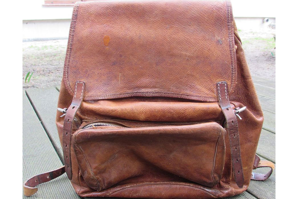 leather-rucksack-front-fade-of-the-day