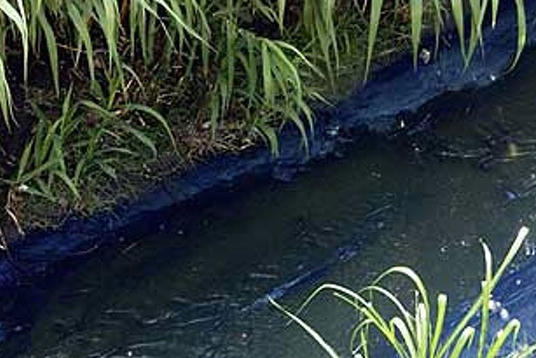 Fig. 3 - Untreated denim dying wastewater in Mexico (via The Guardian / Reuters)