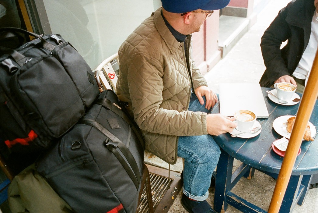 the-hill-side-for-woolrich-bags-seatting-coffie