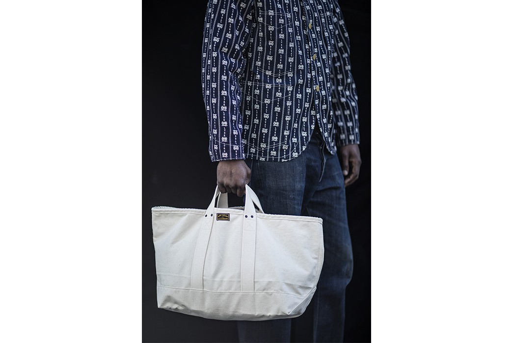 high-grade-u-s-standard-lookbook-shot-by-cory-piehowicz-blue-pants-and-white-blue-shirt-and-white-bag