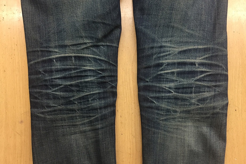 Fade-of-the-Day---Nudie-Grim-Tim-Dry-Orange-(4-Years,-3-Washes,-1-Soak)-legs-back