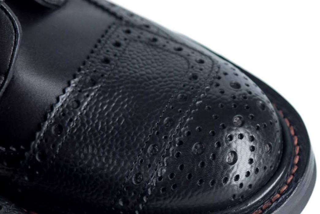 Embossed-Wingtip-Boots---Five-Plus-One-Plus-One---Tricker's-Francis-with-Toe-Strap-in-Pebbled-Black-detailed