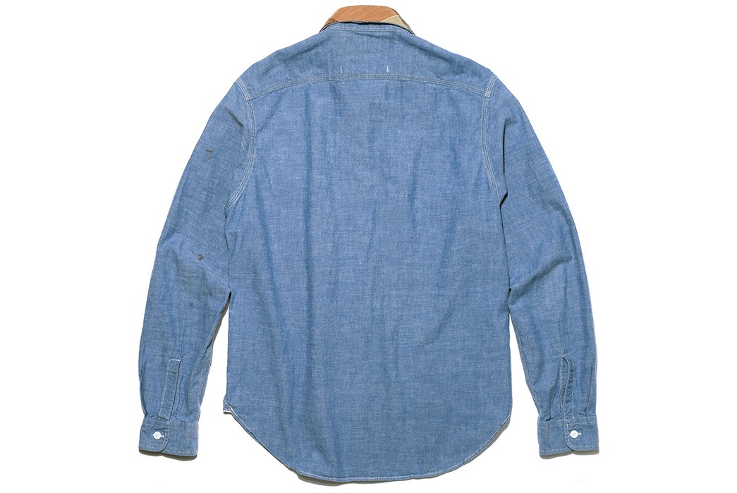 Atelier-&-Repairs'-Unique-Up-Cycled-Chambray-Shirts-are-Made-Using-Vintage-Fabrics-blue-light-and-brown-pocket-collar-back