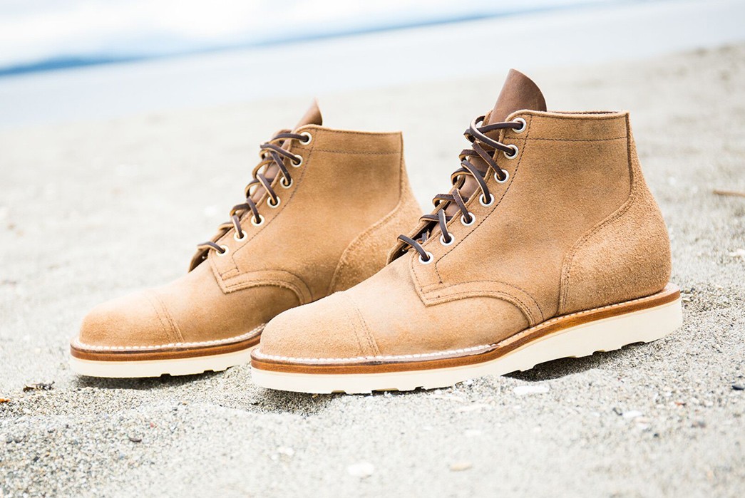 Viberg-Gives-The-Service-Boot-a-Clean-and-Commanding-Update-pair-side-on-beach