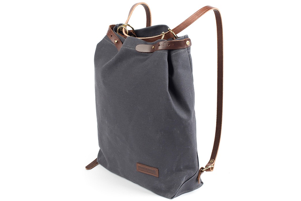 Wood-&-Faulk's-Waxed-Canvas-Shuttle-Pack-is-a-Simple-Twofer-Tote-Backpack-back-side