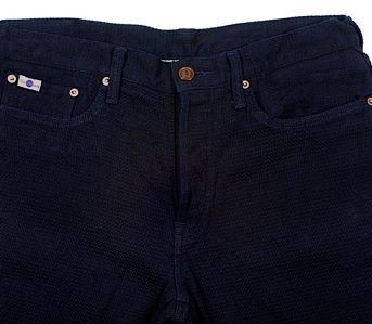 Studio-D'artisan-Indigo-Dyed-Sashiko-Jeans-front-top