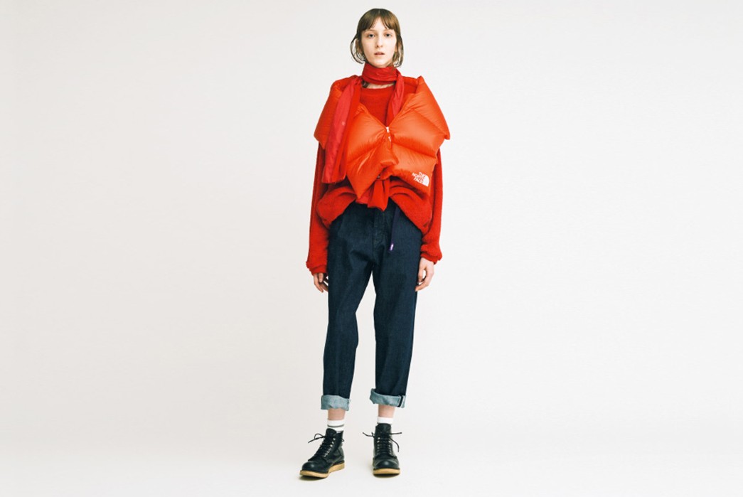 The-North-Face-Purple-Label-Fall-Winter-2017-Lookbook-female-in-orange-jacket-and-dark-blue-pants-2
