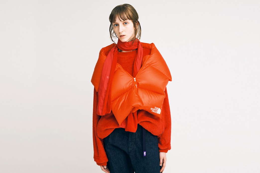 The-North-Face-Purple-Label-Fall-Winter-2017-Lookbook-female-in-orange-jacket-and-dark-blue-pants