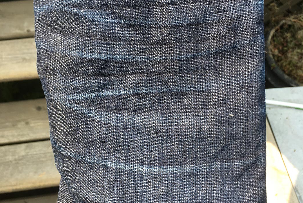 Fade-of-the-Day---Nudie-Thin-Finn-(14-Months,-1-Wash)-back-leg