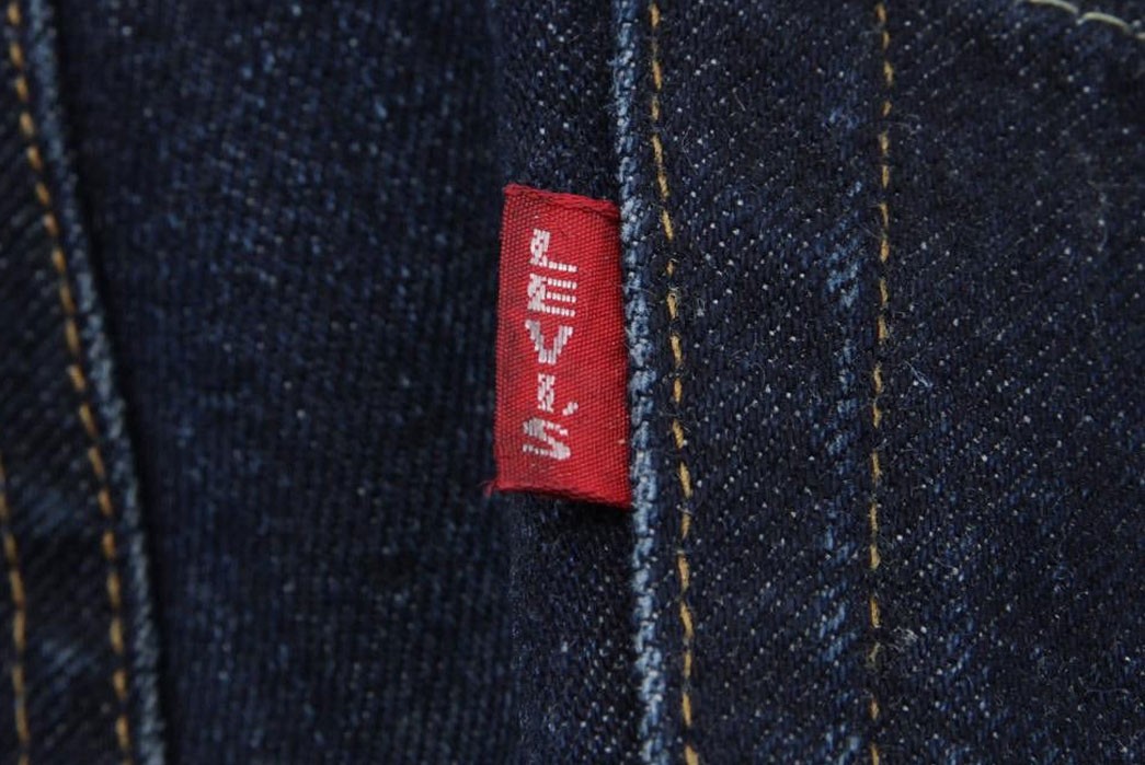 Levi's---History,-Philosophy,-and-Iconic-Products-Big-E-red-tab.-Phased-out-before-1971