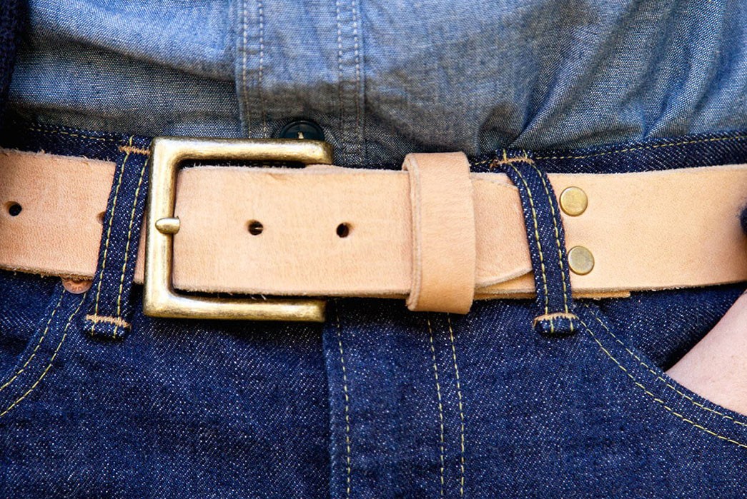 canoe-club-introduces-their-cammello-leather-collection-belt-on-model-front