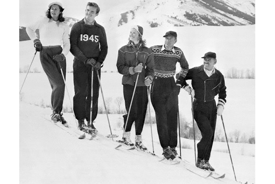 the-history-of-ugly-christmas-sweaters-gary-cooper-in-a-sweater-while-skiing-with-ingrid-bergman-on-his-left-and-clark-gable-on-his-right-image-via-pinterest