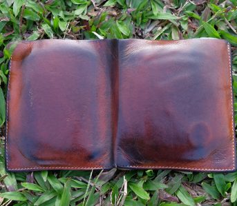 fade-of-the-day-il-bisonte-bi-fold-wallet-8-years-open-outside