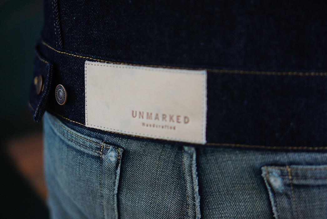 unmarked-boots-sews-up-denim-jackets-back-leather-patch