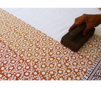 Fabric-Printing-Techniques---Discharge,-Resist,-Silkscreen,-and-More-Woodblock-printing-in-India.-Image-via-Bed-and-Chai.