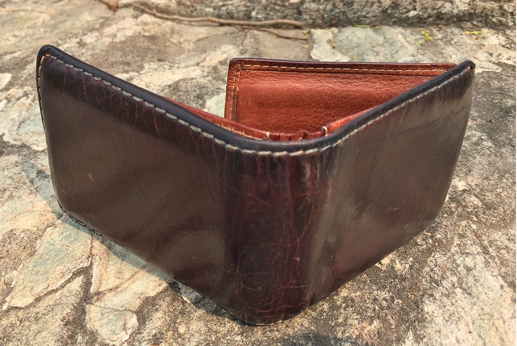 fade-of-the-day-fossil-traveler-wallet-10-years-open-outside-third-wing
