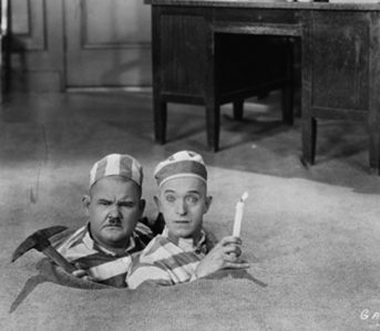 Wabash,-Hickory,-and-Bengal-Oh-My---A-Guide-to-Stripes-of-All-Stripes-Laurel-and-Hardy-in-Pardon-Us-(1931).-Image-via-The-End-of-Cinema.