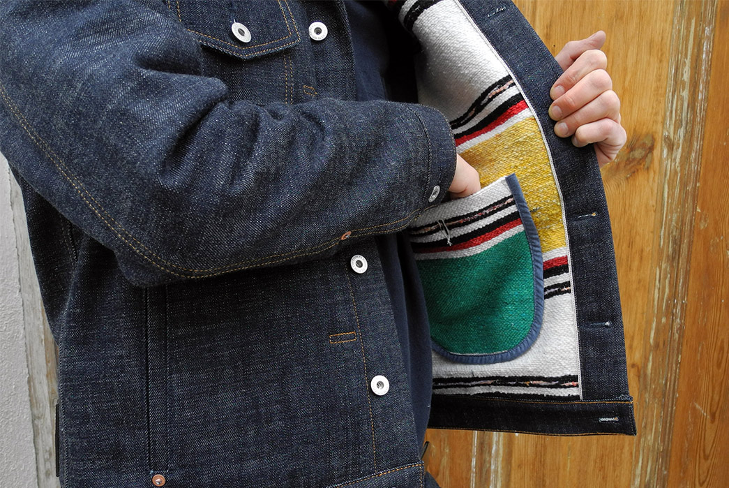 Traditional-Wool-Moroccan-Blankets-Line-Companion's-Newest-Trucker-Jacket-hand-in-inside-pocket
