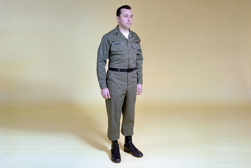 A soldier models the durable press OG-507 fatigue uniform at the U.S. Army Natick Soldier Research, Development & Engineering Center. April 8, 1977. Image Via Digital Commonwealth