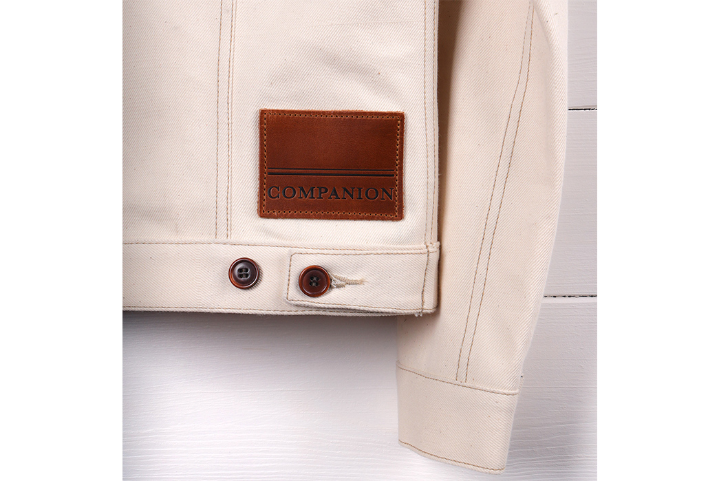 Companion's-Nevada-Jacket-is-14oz.-of-Deadstock-White-Hot-White-Oak-Denim-back-leather-patch-and-sleeve