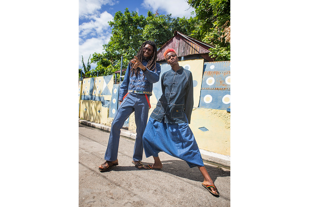 Kapital's-Yardie-Blues-Lookbook-Meanders-Through-Jamaica-and-Misadventure-male-and-female-in-a-front-of-old-fence