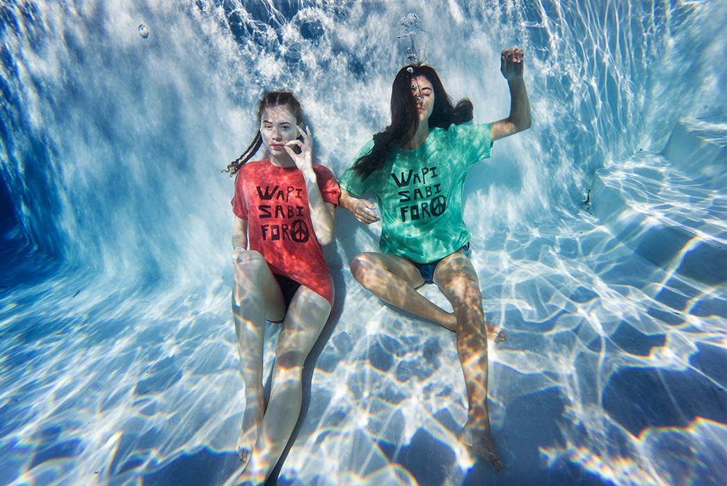Kapital's-Yardie-Blues-Lookbook-Meanders-Through-Jamaica-and-Misadventure-two-females-one-in-red-and-second-in-green-dive