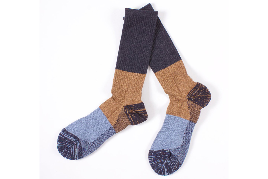 Anonymous-Ism-Digs-Their-Heels-Into-Hemp,-Cable-Knit,-and-Fair-Isle-blue-brown