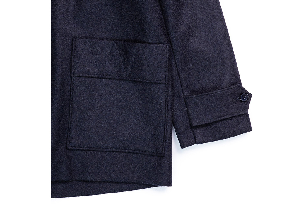 Arpenteur's-Kabig-Coat-Conquers-the-Cold-With-Melton-Wool-pocket-and-sleeve