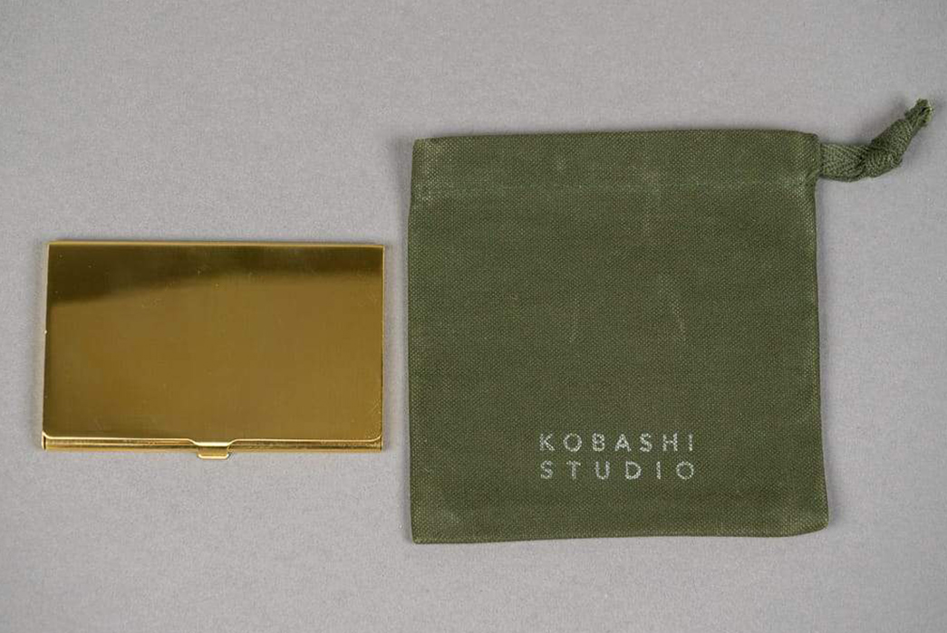 Kobashi-Studios-Gets-Down-To-Brass-Tacks-With-a-Solid-Card-Case-with-bag