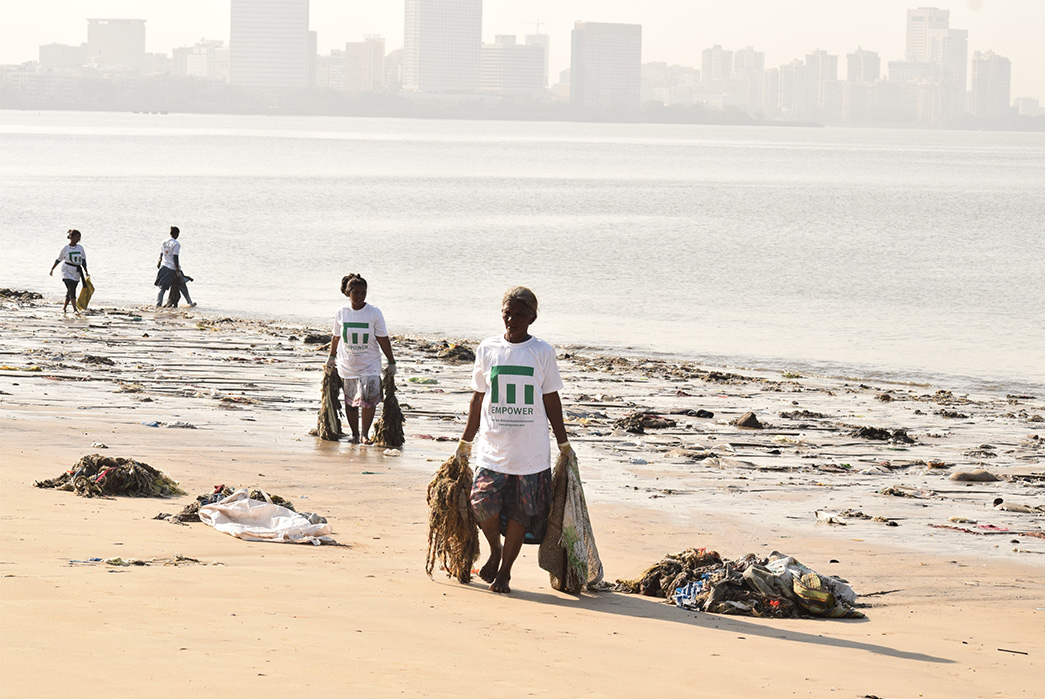 Sustainable-Sneakers-Cutting-Through-the-Buzzwords-A-beach-cleanup-organised-by-Empower,-which-is-supported-by-New-Movements.-Image-via-Empoer