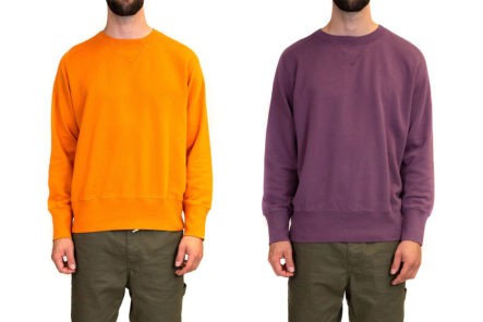 Levi's-Vintage-Clothing-Dyes-Its-Classic-Bay-Meadows-Sweatshirt-In-Two-Oh-So-80s-Colors-front-model-orange-and-purple