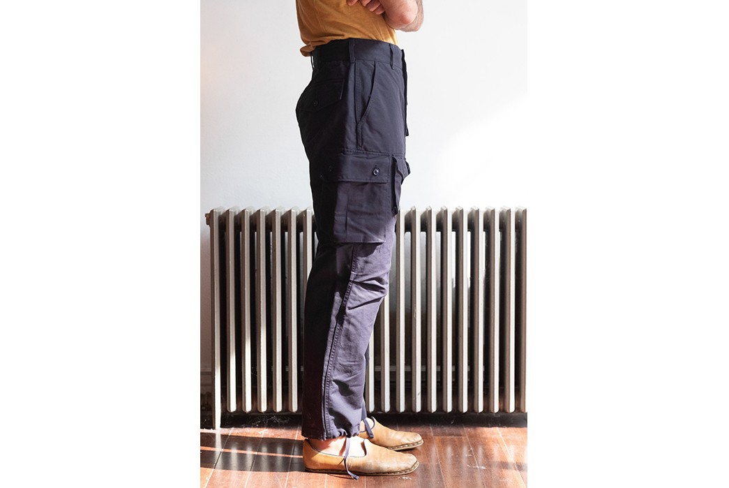 Stash-Your-Whole-Life-In-Engineered-Garment's-Double-Cotton-FA-Pant-model-side