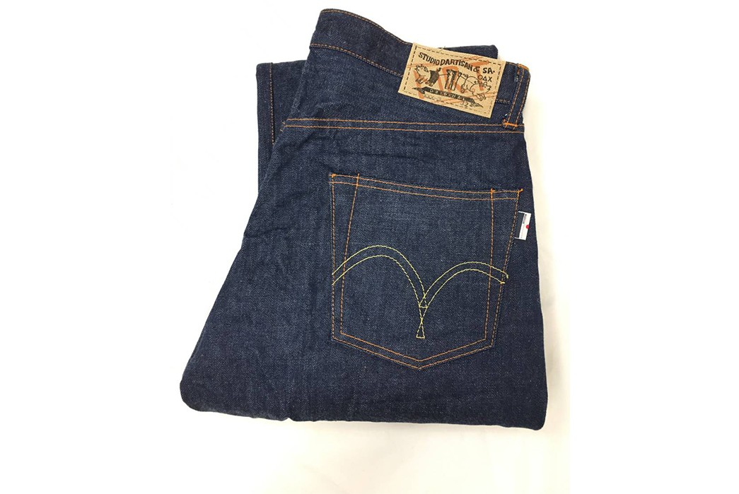 A pair of deadstock Studio D'Artisan jeans, which feature a 'Mr.T' stamp on the waist patch to represent Tagaki-san, and arcuates that almost completely replicate those of Levi's