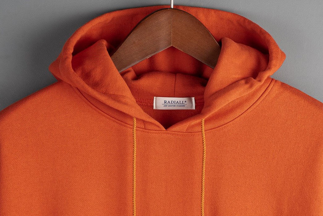 Radiall-Supplies-A-Trio-Of-Ultimate-Lockdown-Sweat-Suits-orange-front-top-hood