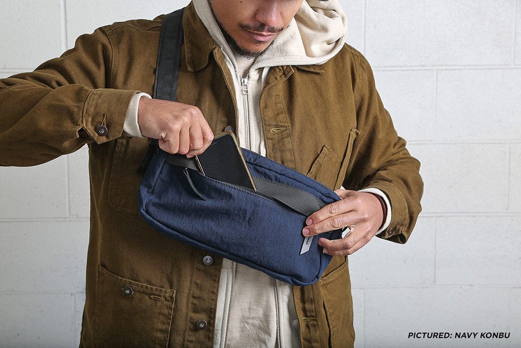 Tanner-Applies-Revolutionary-Konbu-Fabric-To-Its-Canyon-Bag-blue-in-hands