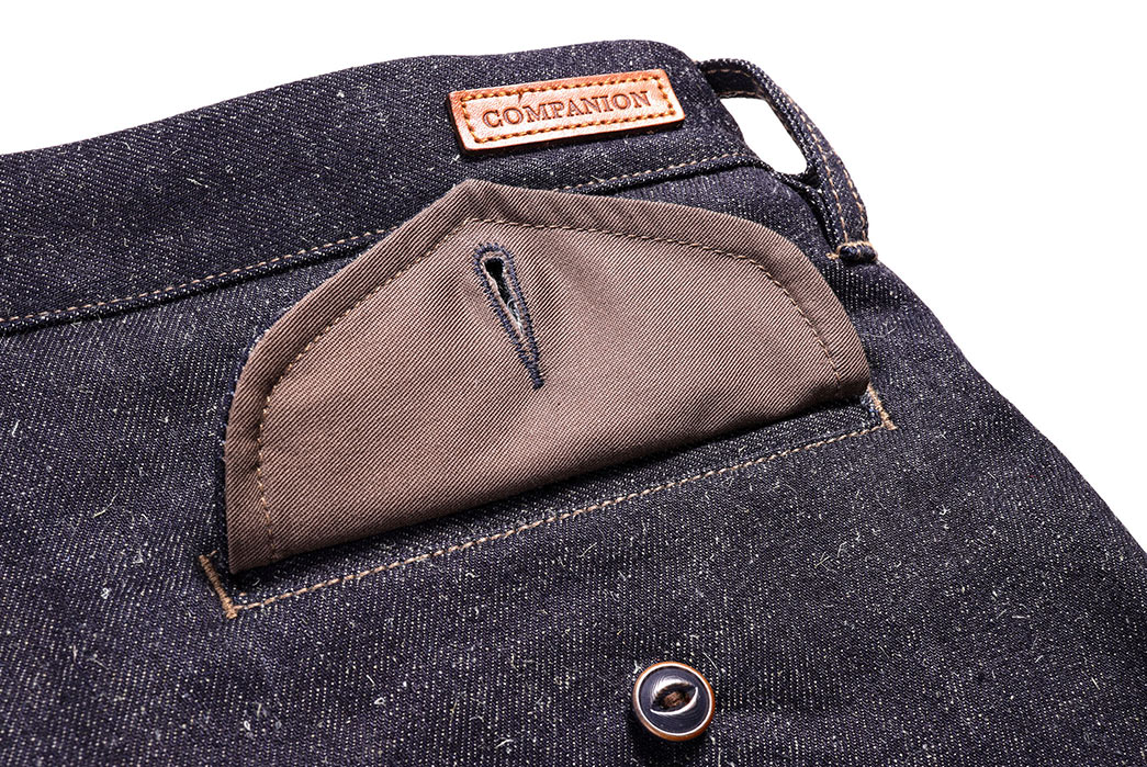 Companion-Denim-Renders-Its-Deck-Chino-In-a-Bamboo-Cotton-Blend-front-top-pocket-open