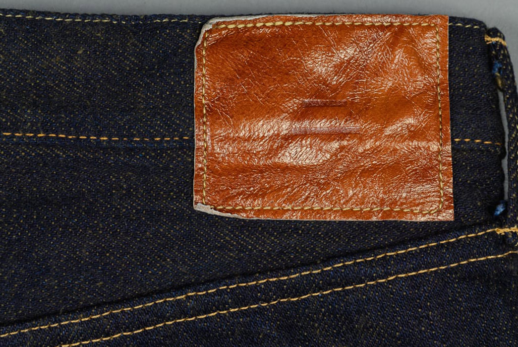 Tanuki's-Heavy-Kusaki-Regular-Jeans-Are-Partially-Dyed-With-Pomegranate-Skin-back-top-leather-patch