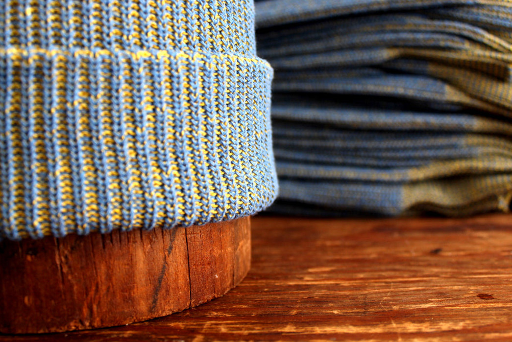 Update-Stock-Makes-Recycled-Cotton-Beanie-With-Proceeds-Going-To-Ukraine-Non-Profit-on-wood
