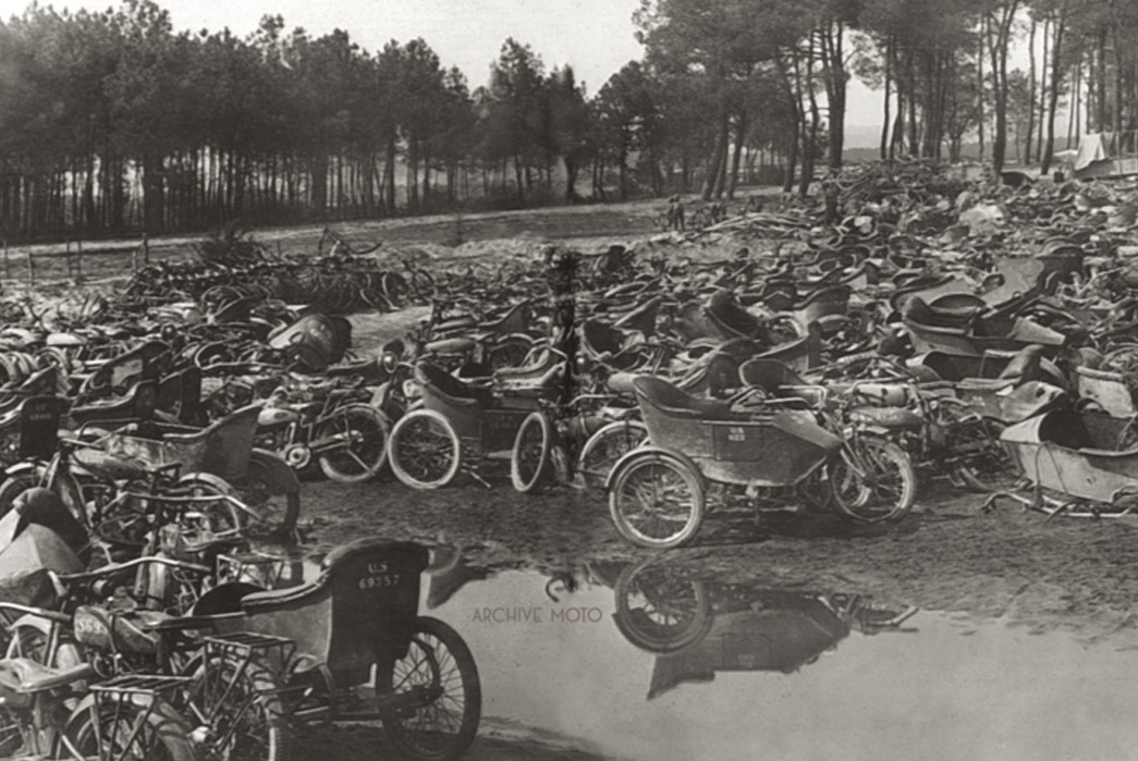 The-Gentleman-Biker-Workwear-That-May-Revitalize-a-Subculture-A-U.S.-military-motorcycle-boneyard-near-Le-Mans,-France-around-the-time-of-the-Armistice. -Image-via-Archive-Moto.
