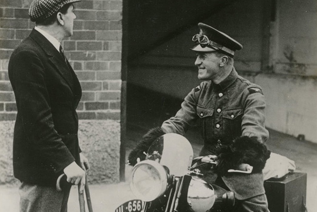The-Gentleman-Biker-Workwear-That-May-Revitalize-a-Subculture-Colonel-T.-E.-Lawrence,-the-immortal-Lawrence-of-Arabia,-is-seen-in-uniform-on-the-back-of-a-Brough-Superior-SS100.